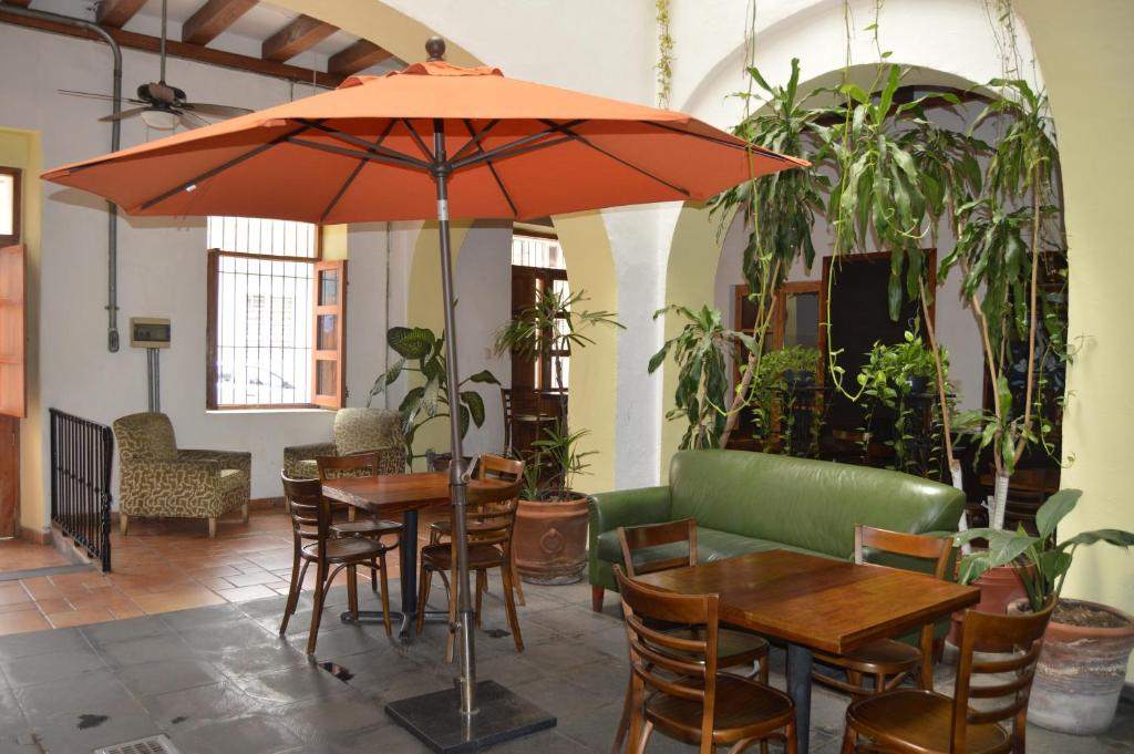 Open-air courtyard with seating at Hotel Meson del Mar in Veracruz